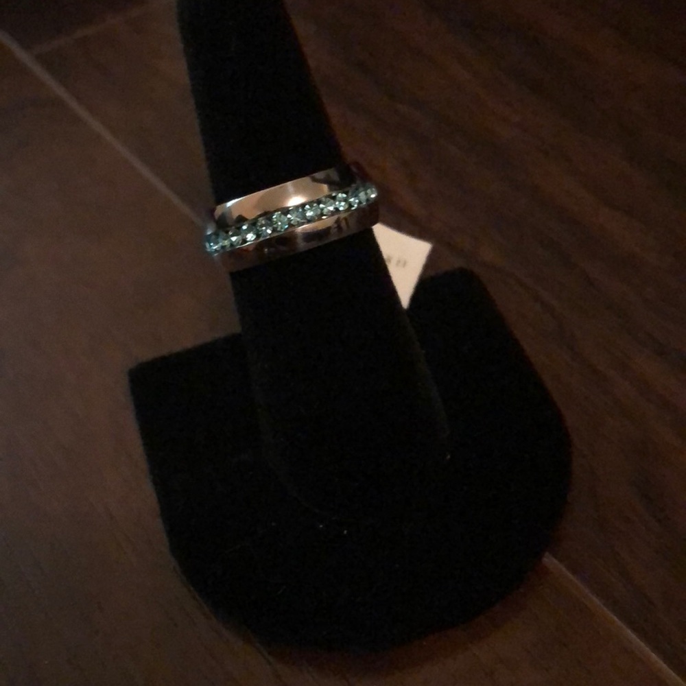 Silver band with beautiful blue topaz stones